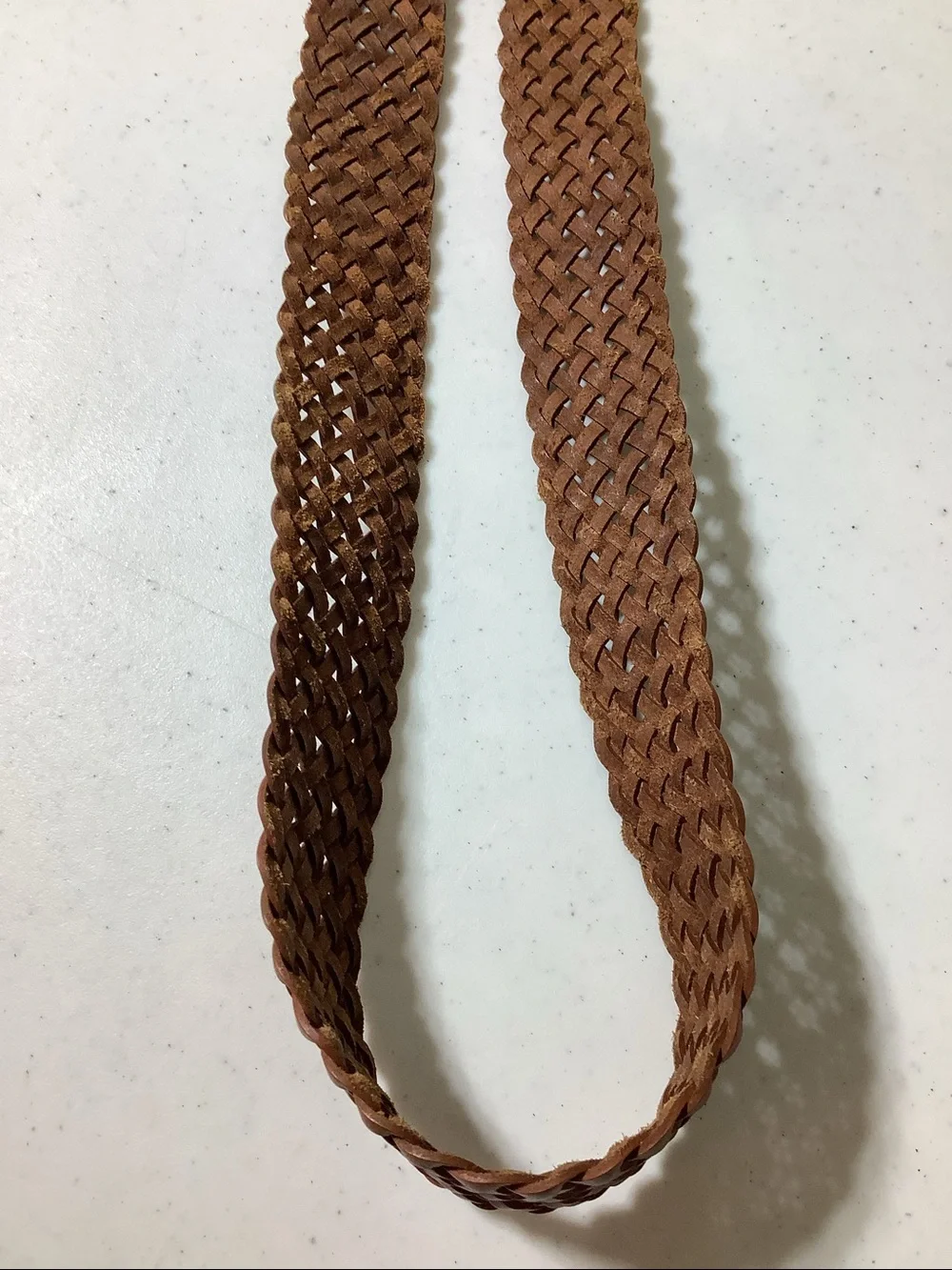Leather caramel colored braided belt from India, 37”